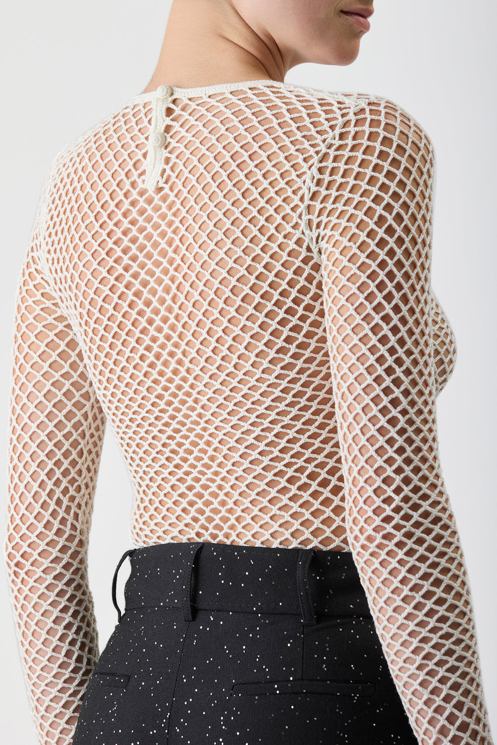 アイボリーメリノウールのTrothニットトップ