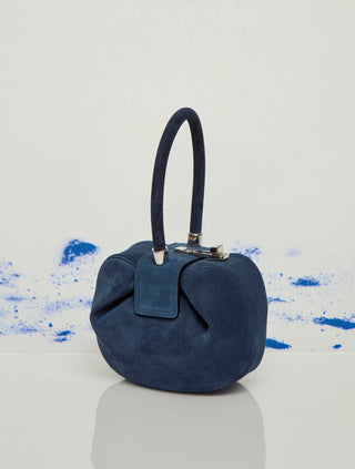 Navy Corduroy Structured Handbag - Studio Shot with Blue Paint | Gabriela Hearst