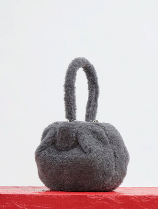 Dark Grey Cashmere Nina Bag on Red Surface - Styled Lookbook, Virgin Wool Shearling | Gabriela Hearst