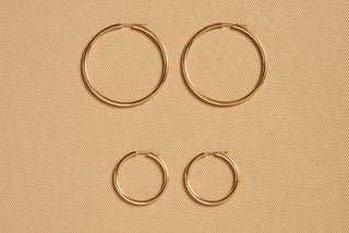 18K Yellow Gold Hoop Earrings - Two Size Comparison Flat Lay | Gabriela Hearst