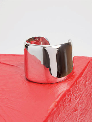 White Gold Cuff Bracelet - Styled on Red Leather | Gabriela Hearst
