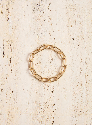 Small Link Gold Bracelet - Styled on Textured Stone Surface | Gabriela Hearst