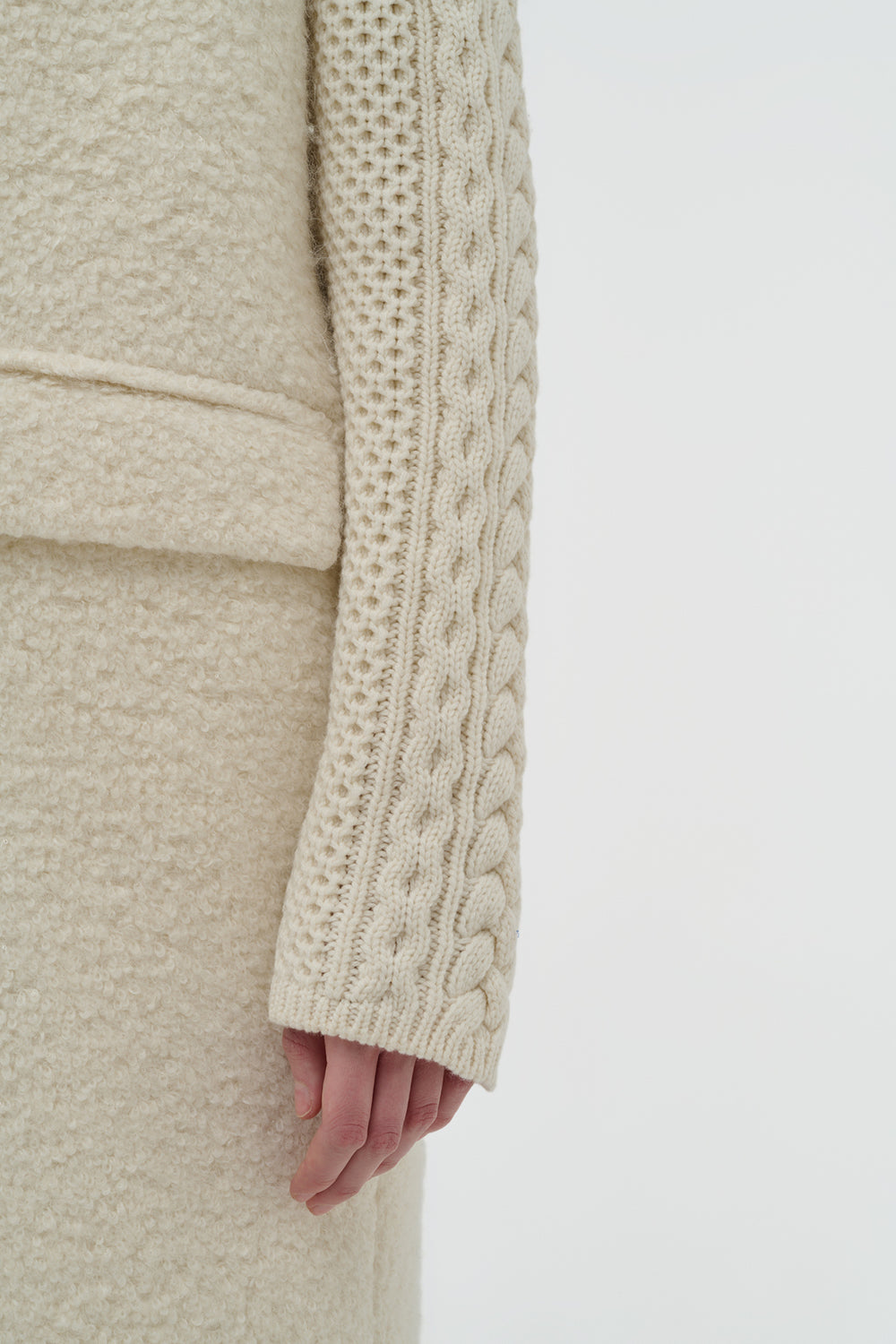 Charles Coat in Ivory Recycled Cashmere Boucle with Cable-knit Sleeves