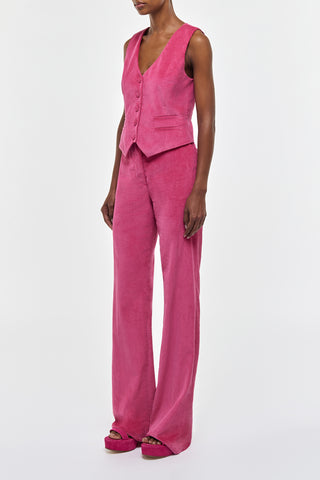 Fuchsia Corduroy Vesta Flare Pants - Side Angle On Model | Gabriela Hearst
