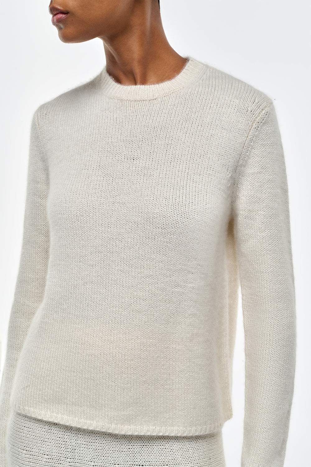 アイボリーカシミアのタイタスニットセーター