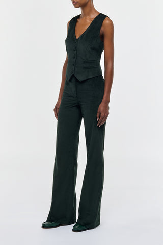 English Green Corduroy Coleridge Vest and Trousers - Side Profile On Model | Gabriela Hearst