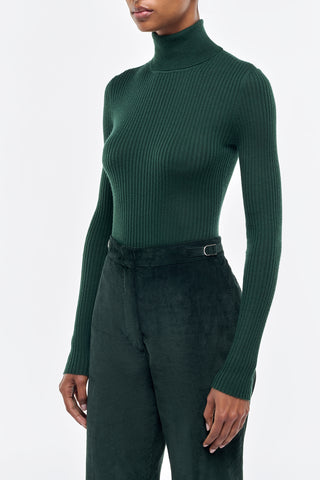 English Green Cashmere Turtleneck - Side Profile On Model | Gabriela Hearst