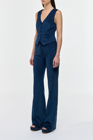 Electric Navy Corduroy Vesta Flare Pants - Side View On Model | Gabriela Hearst