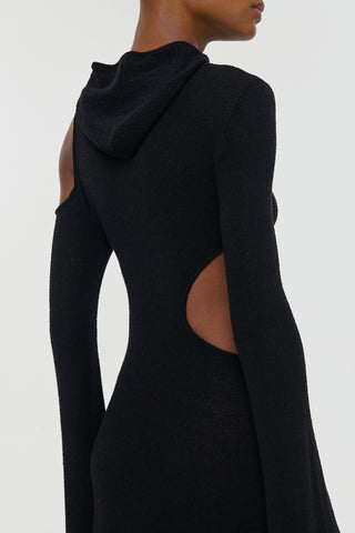 Black Silk Daya Cutout Knit Hoodie Maxi Dress Revealing Side Cutout and Hood - Studio Side Profile | Gabriela Hearst