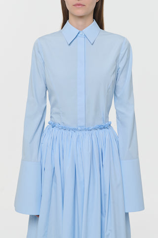 Light Blue Sea Island Cotton Jataya Shirt with Gathered Skirt - Front View On Model | Gabriela Hearst