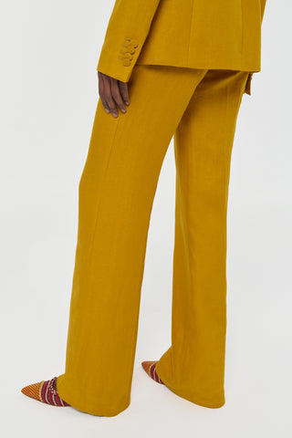 Golden Birch Linen Vesta Flare Pant - Detail Crop On Model | Gabriela Hearst
