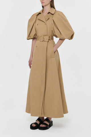 Camel Sea Island Cotton Puff Sleeve Trench - Side View On Model | Gabriela Hearst