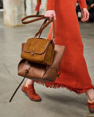 Cognac Suede Leonora Bag - Lifestyle On Model with Orange Dress | Gabriela Hearst