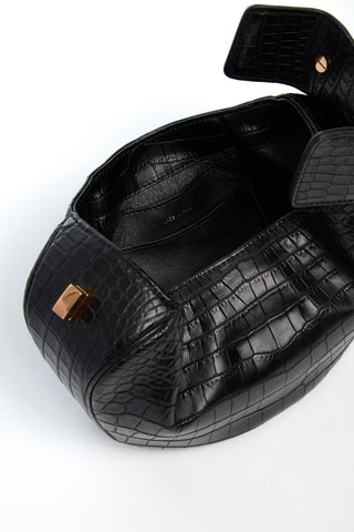 Black Crocodile Leather Demi Bag - Lifestyle Shot on Stone, Rose Gold Hardware | Gabriela Hearst