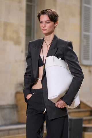 Black Linen Epona Blazer - Close-Up Model Portrait with White Clutch | Gabriela Hearst