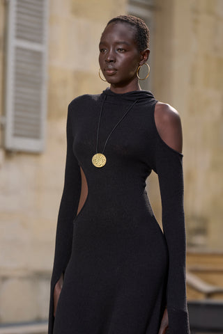 Black Silk Daya Hooded Maxi Dress with Shoulder Cutout and Gold Pendant Necklace - Runway Close-up | Gabriela Hearst