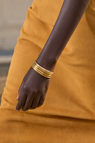 18K Gold Bangles Stacked - On Model | Gabriela Hearst