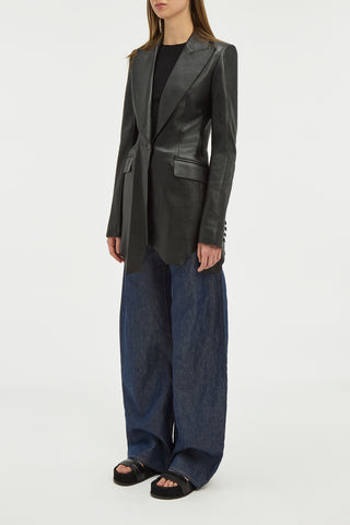 Black Leather Sybel Blazer - Three Quarter Side Profile On Model, Raw Cut Hem | Gabriela Hearst