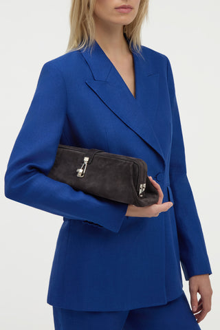 Dark Grey Suede Clutch - On Model with Blue Suit | Gabriela Hearst