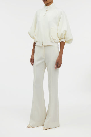 Ivory Virgin Wool Rhein Flare Pant - On Model Side View, Styled Look | Gabriela Hearst
