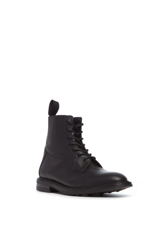 Black Leather Calvert Military Boot - Three Quarter Front View, Vibram Outsole | Gabriela Hearst