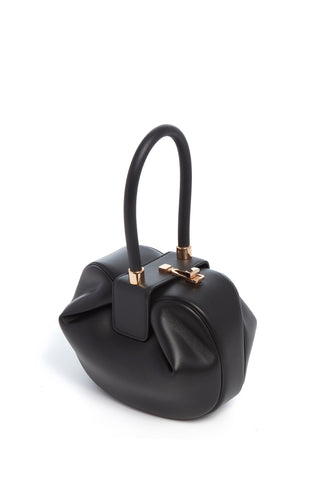 Black Nappa Leather Nina Bag Turnlock Detail - Angled View | Gabriela Hearst
