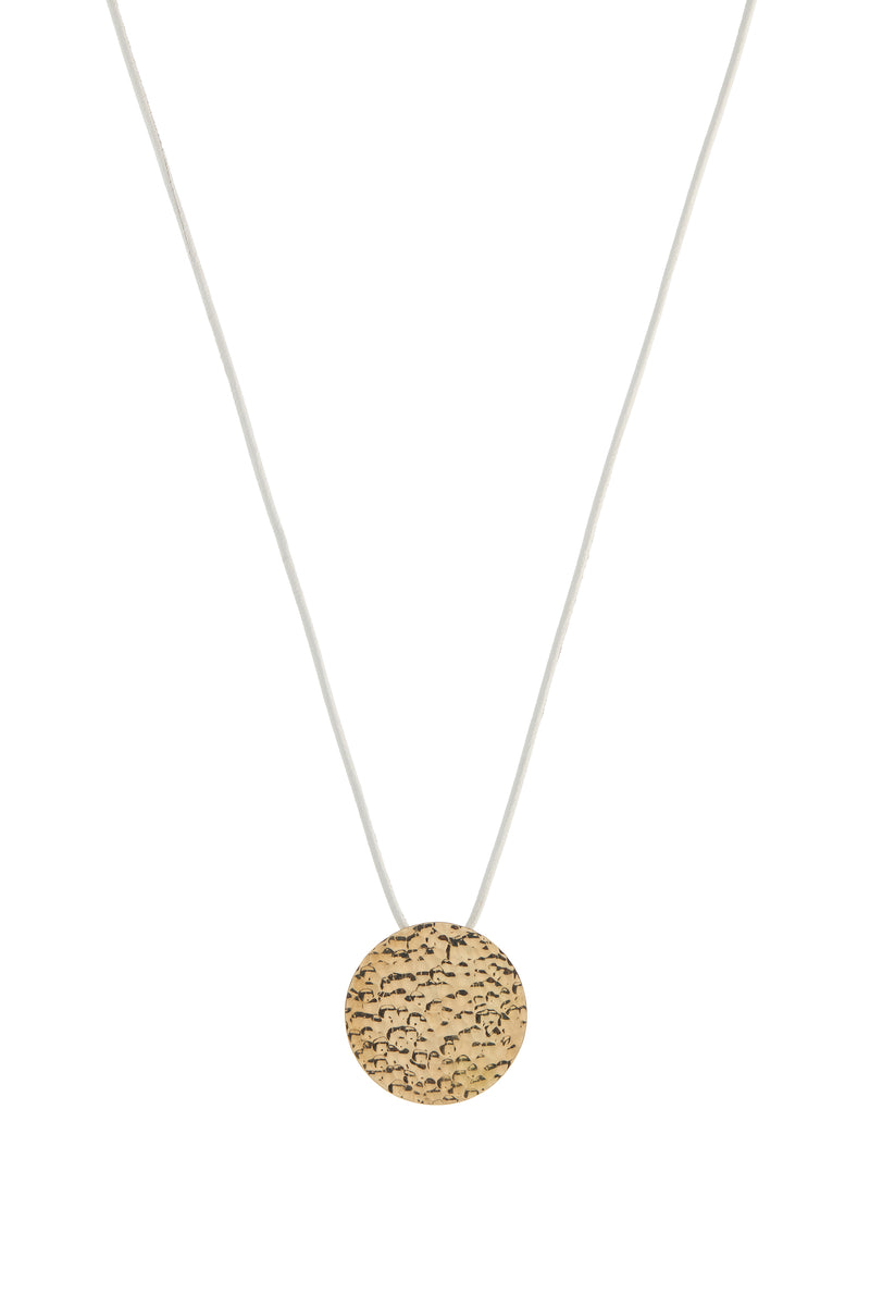 18K Yellow Gold Wheel of Fortune Pendant on White Cord - Front View | Gabriela Hearst