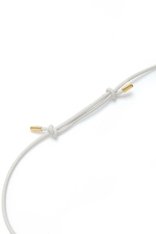 White Leather Cord with Gold Hardware Detail - Product Close-up | Gabriela Hearst