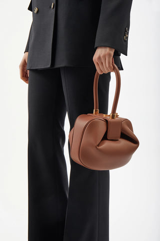 Cognac Nina Bag - On Model with Black Tailored Suit | Gabriela Hearst