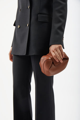 Cognac Nappa Leather Soft Demi Clutch - Model Carrying | Gabriela Hearst