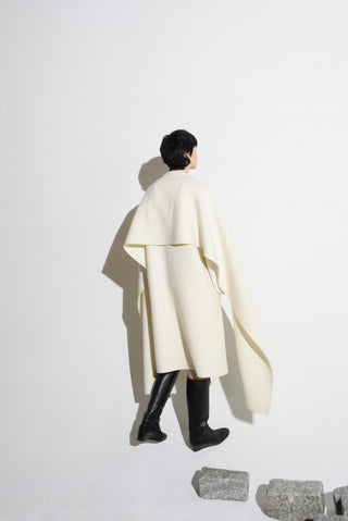 Cream Wool Cape Coat with Black Leather Boots - Back View | Gabriela Hearst