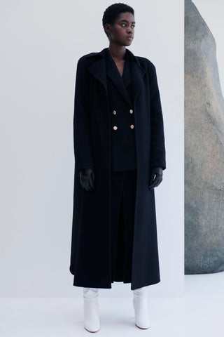 Navy Wool Double-Breasted Coat with White Boots - Front View | Gabriela Hearst