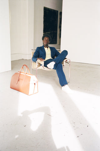 Navy Wool Suit with Cream Top and Cognac Leather Handbag - Styled Look | Gabriela Hearst