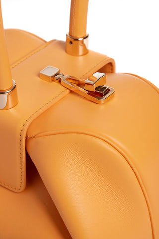 Fluorescent Orange Nina Bag Hardware Detail - Turnlock Closure | Gabriela Hearst