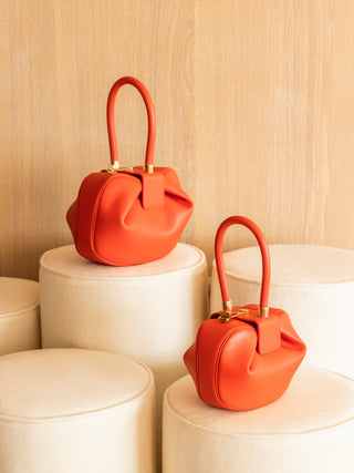 Spice Red Nappa Leather Nina Bags - Styled Display | Gabriela Hearst