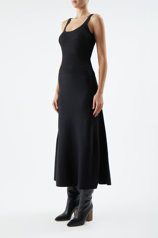 Black Pointelle Knit Cashmere Tank Styled with Midi Skirt - Side Profile On Model | Gabriela Hearst