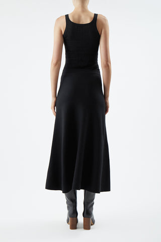 Black Cashmere Silk Tank Styled with Flared Midi Skirt - Back View On Model | Gabriela Hearst