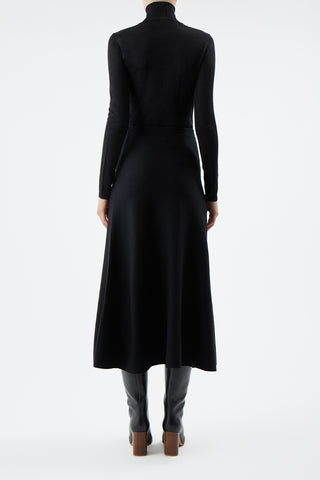 Black Knit Midi Skirt with Turtleneck - Back View On Model | Gabriela Hearst